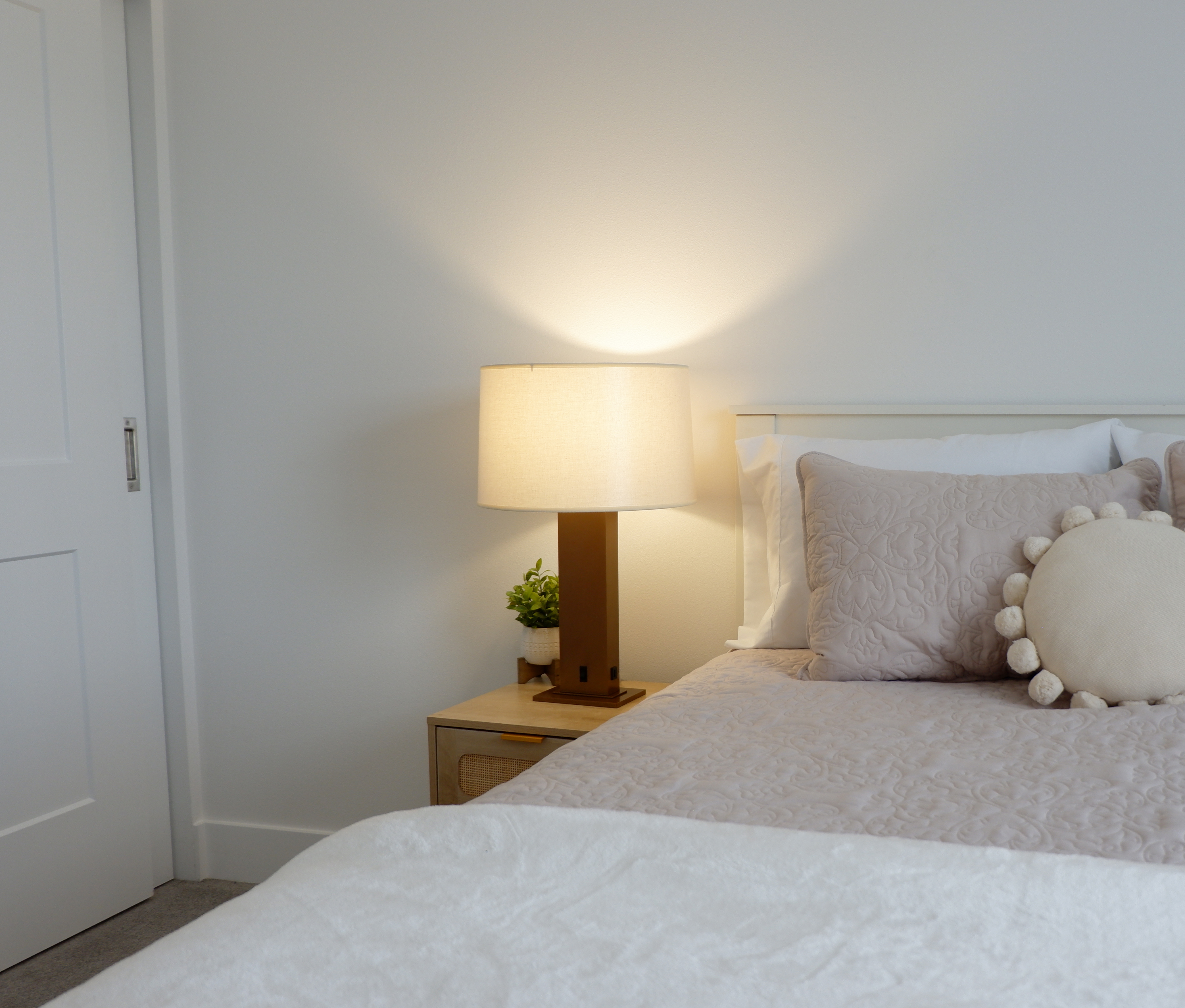 JES Lighting — lamp on bedside table